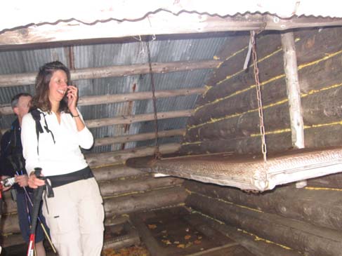 Claudette laughing at the shelter's bunk bed (photo by Dennis Marchand)