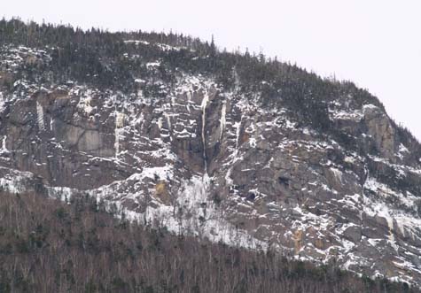 View of icy ledges on East Osceola as seen from lower Greely Pond (photo by Sharon Sierra)