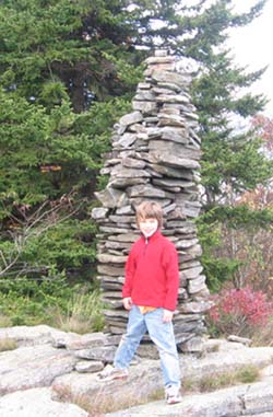 Little hiker and tall cairn (photo by Dennis Marchand)